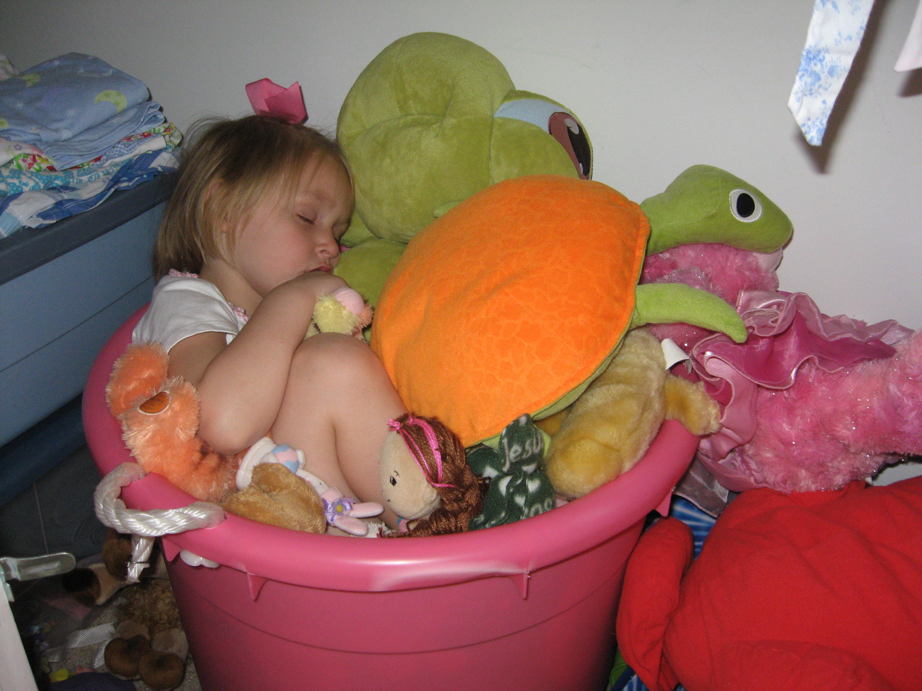 2008_05_24 Cate asleep in tub of toys.jpg
